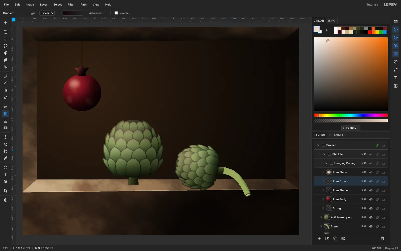 A dark red pomegranate hanging on a thin string, with a crown of sepals and a soft highlight