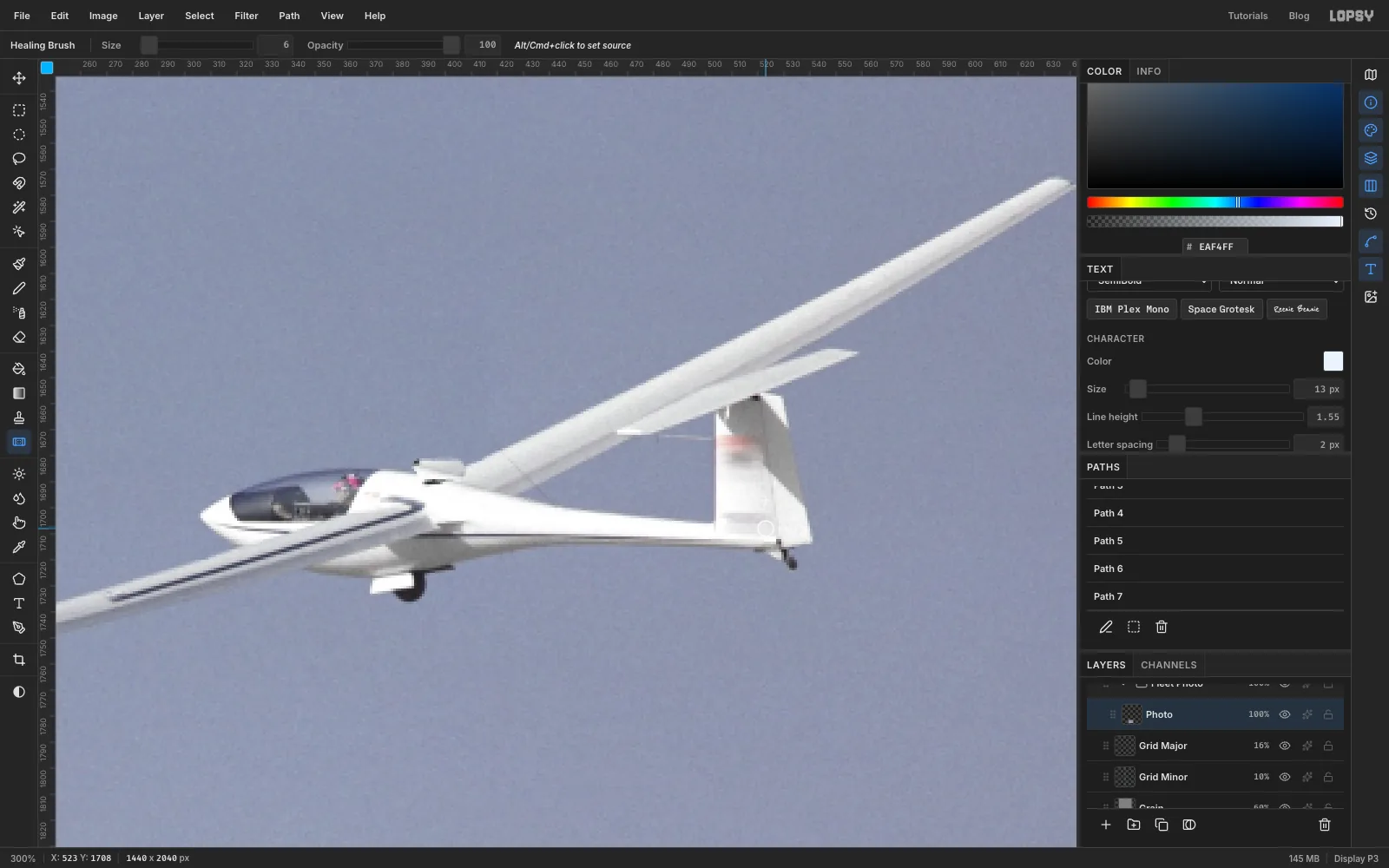 Zoomed to 300 percent: the engine mast is gone and the NASA lettering is healed out of the tail fin