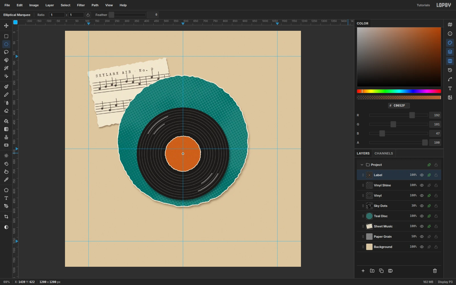 The record with thin white highlight arcs in two quadrants and a copper torn-paper label with a cream edge and spindle hole