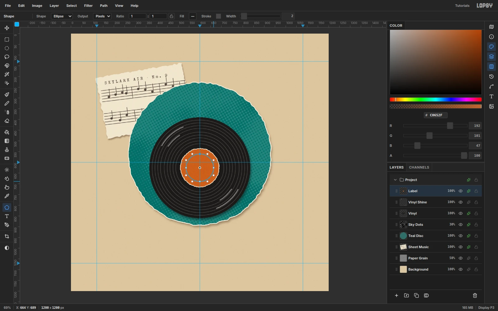 A thin blue circular path 128 px across drawn on top of the copper label