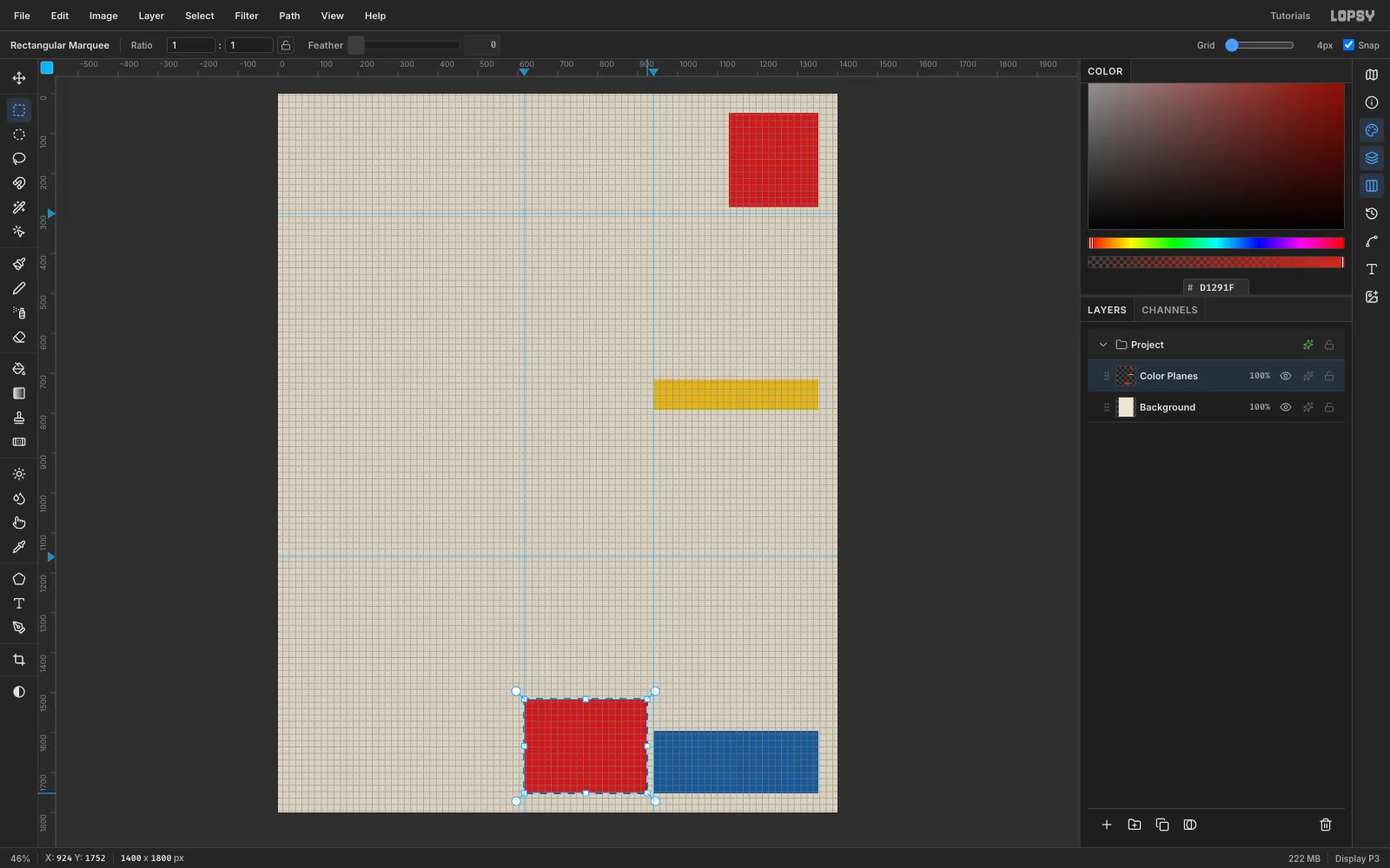 A 4 px grid over the cream page with snap on and a marquee around the lower red block, with red, yellow and blue blocks already filled