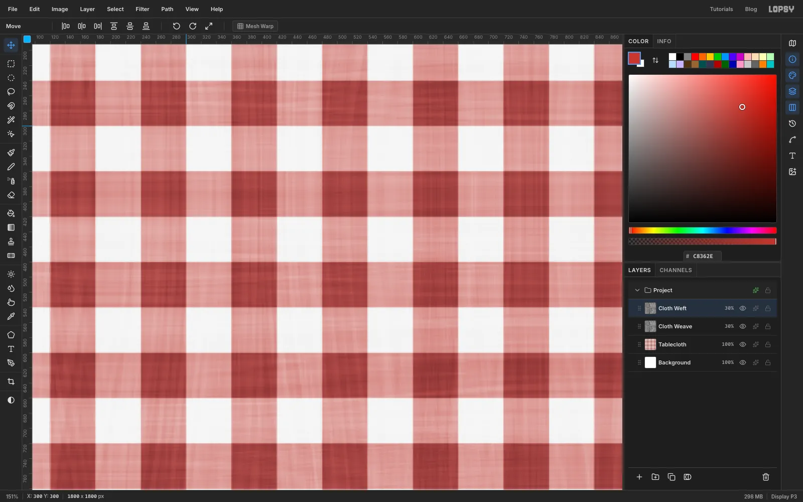 A close-up of the muted red gingham with a soft blur and a fine woven texture of crossing threads