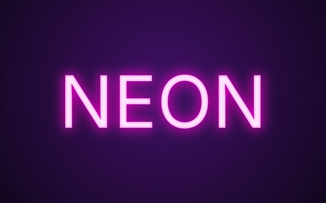 The word NEON in glowing pink neon letters on a dark purple background