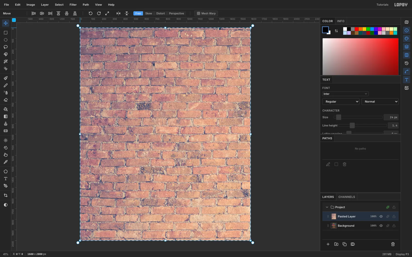 The 1600 by 2000 canvas filled with a pasted photo of a red brick wall, with transform handles around it