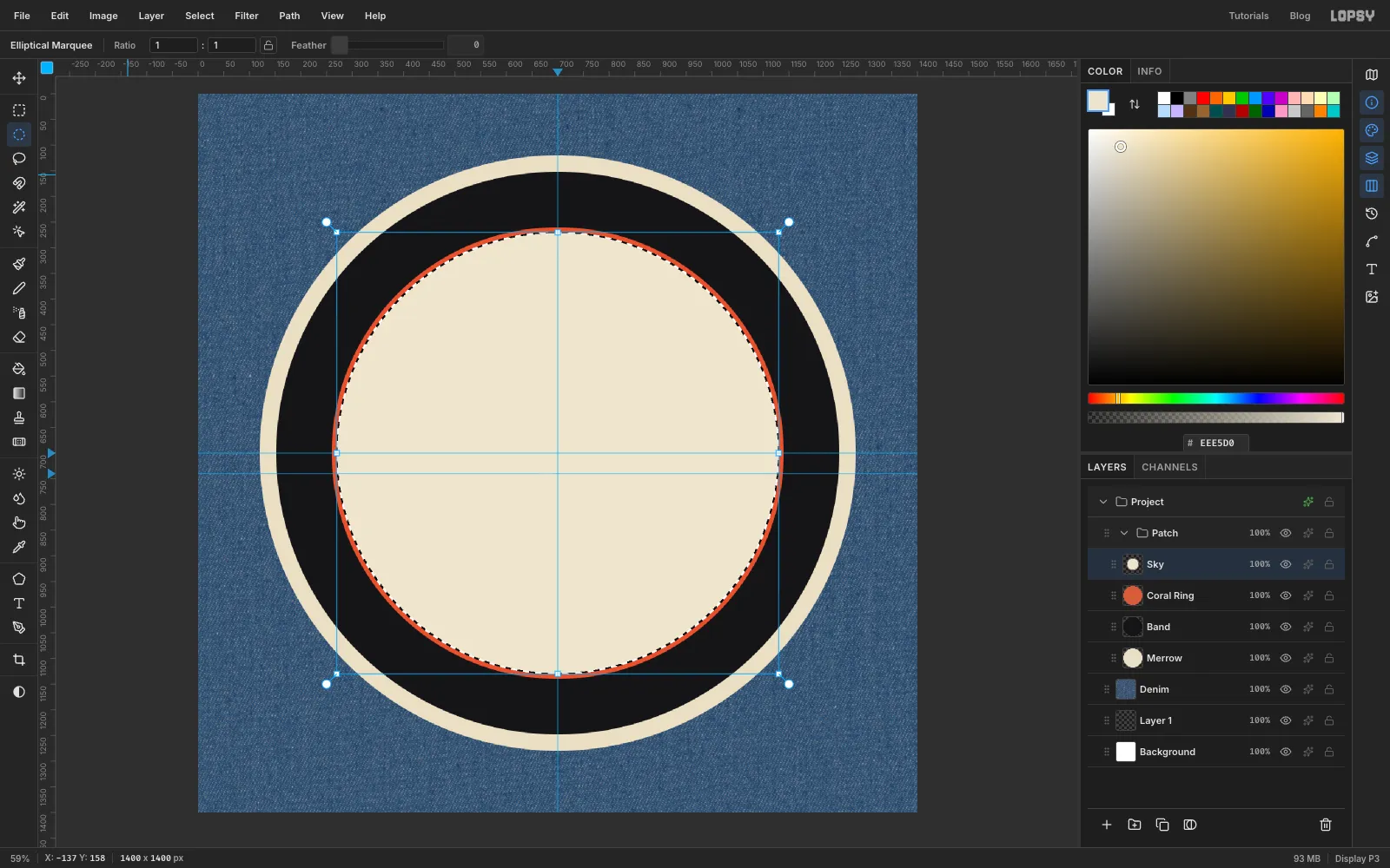 Four concentric circles on the denim: a cream outer ring, a wide black band, a thin coral ring and a cream inner disc, with the marquee still around the inner disc
