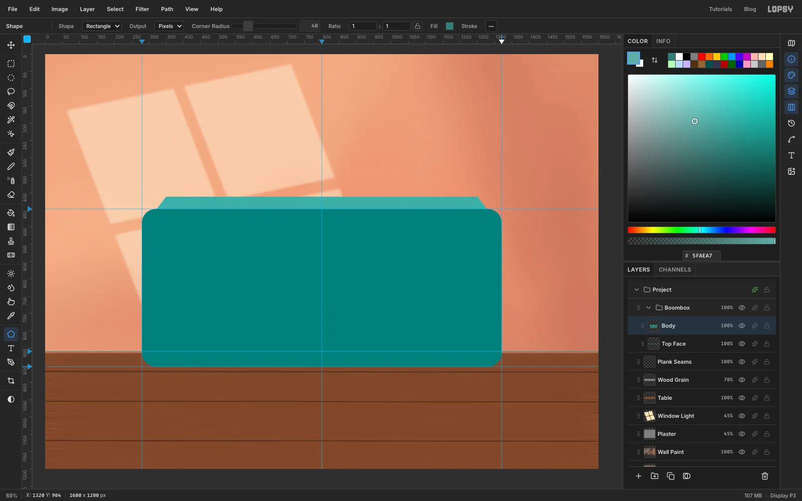 A rounded teal box sits on the table, with a lighter strip of top face showing above it