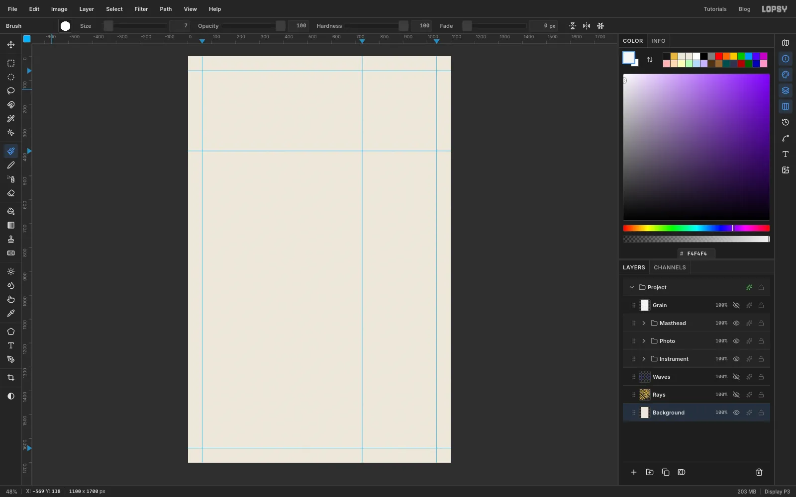 The empty cream page with blue guides at the margins and two guides crossing in the upper right